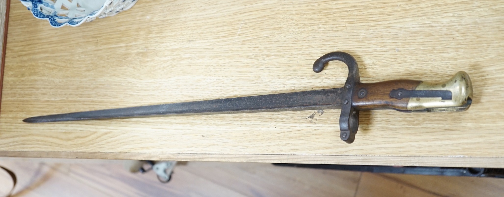 A 19th century French bayonet, dated 1878, 64cms long